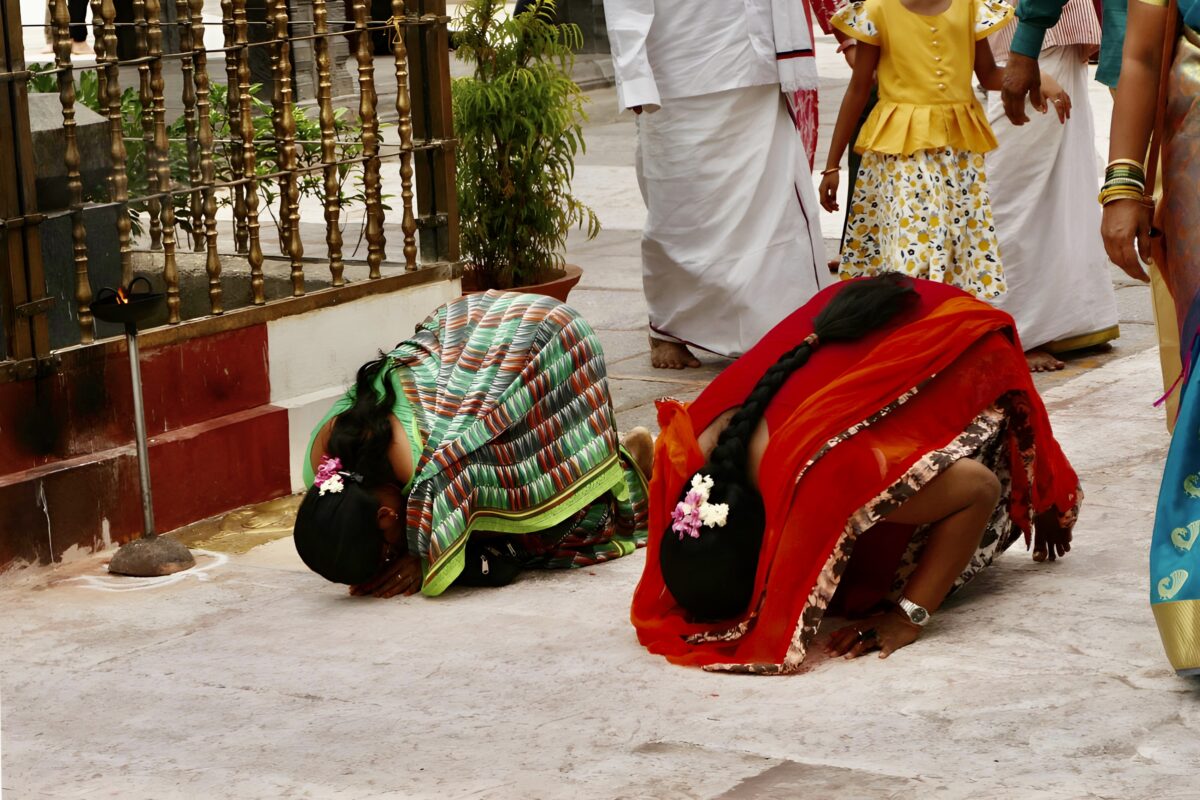 Praying women India